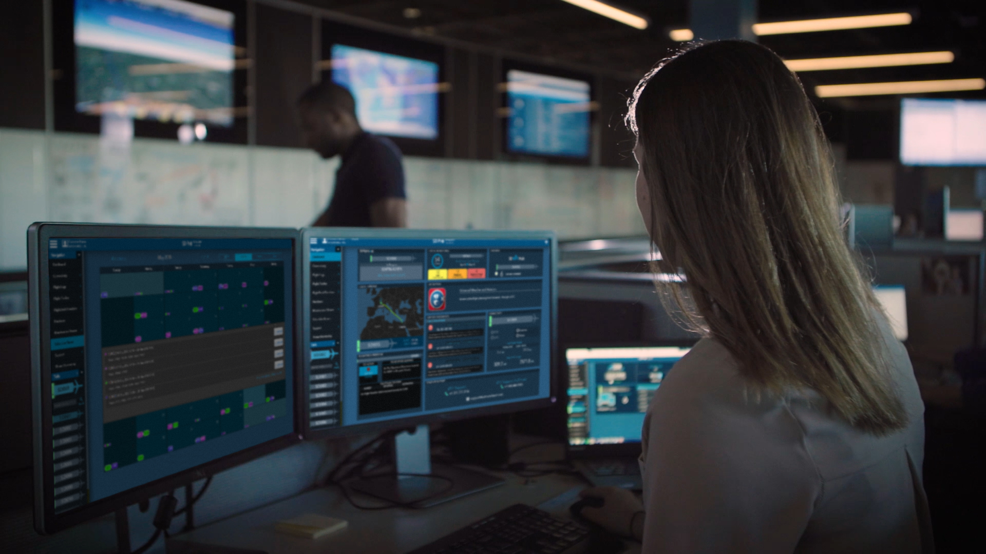 woman inside the network operations center talking with customer